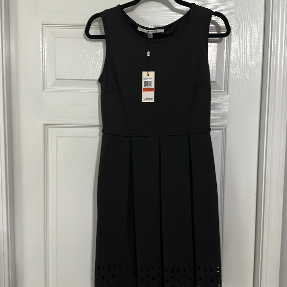 New with tags! Little black dress ! Nice details and stretchy fabric !